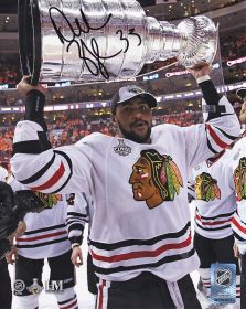 Dustin Byfuglien Signed Chicago Blackhawks 2010 Stanley Cup Holding Trophy Photo